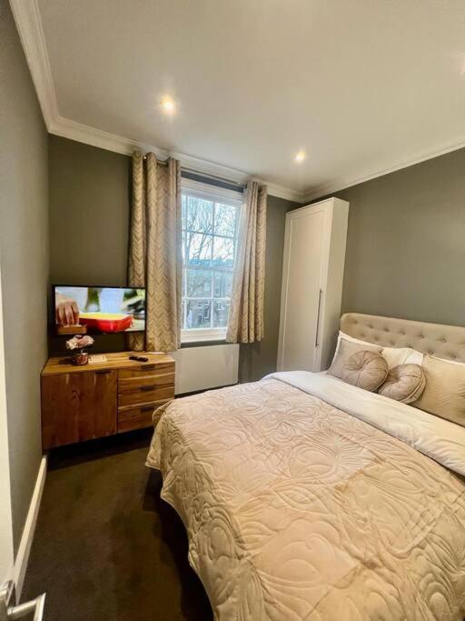 Апартаменты Flat In The Heart Of Holland Park Лондон Экстерьер фото