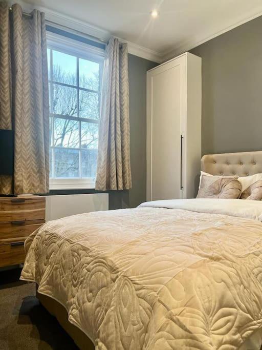 Апартаменты Flat In The Heart Of Holland Park Лондон Экстерьер фото